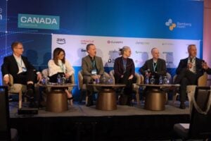 Brian Simmers speaking at the Canada Health Innovation Summit in Montreal, participating in a panel on national health care innovation.