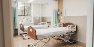 Participant beds inside the Mount Saint Joseph Hospital Phase 1 Clinical Trials Unit designed for early-stage clinical research and volunteer monitoring.