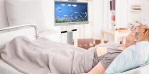 Patient using MindfulGarden technology for delirium care